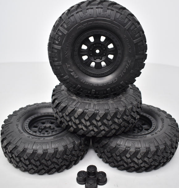 Axial Capra Unlimited 1.9 Nitto Trail Grapplers 1.9 Monster tires mounted on injection-molded, 3-piece, licensed Raceline beadlock wheels (2)